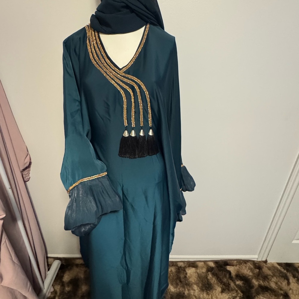 Elegant Teal Dress with Gold Accents